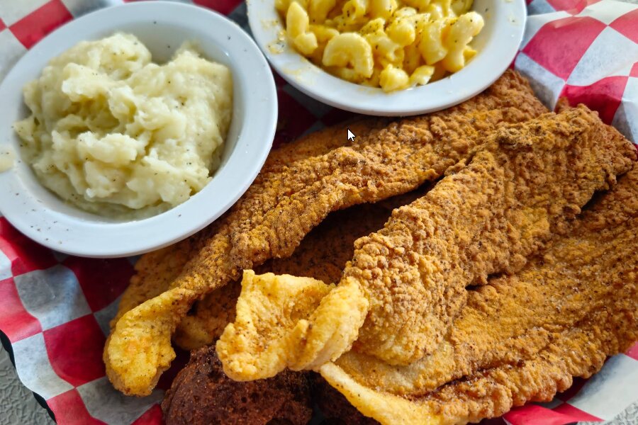 Fried catfish platter with mac and cheese and potato salad
